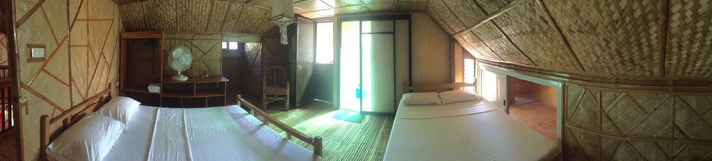 Bamboo House Beach Lodge & Restaurant Puerto Galera Exterior photo